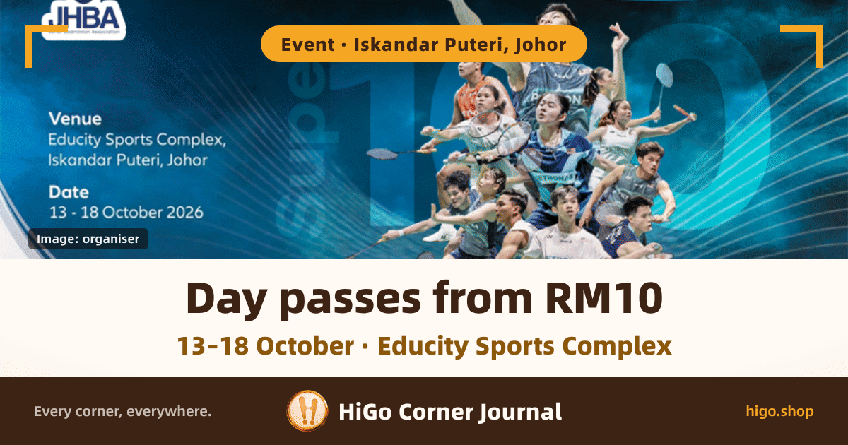 Event-poster cover: the JHBA crest top left, and a tab across the top reading "Event · Iskandar Puteri, Johor"; down the left, in white, Venue — Educity Sports Complex, Iskandar Puteri, Johor, and under it Date — 13 - 18 October 2026; a small dark credit tab bottom left reading "Image: organiser"; centre right, a composite of a dozen or so players mid-swing in kit marked PETRONAS, with "Super 100" printed faintly behind them; the cream band below reads "Day passes from RM10" in large type, with "13–18 October · Educity Sports Complex" under it; the brand strip at the foot reads "Every corner, everywhere." and "HiGo Corner Journal", higo.shop